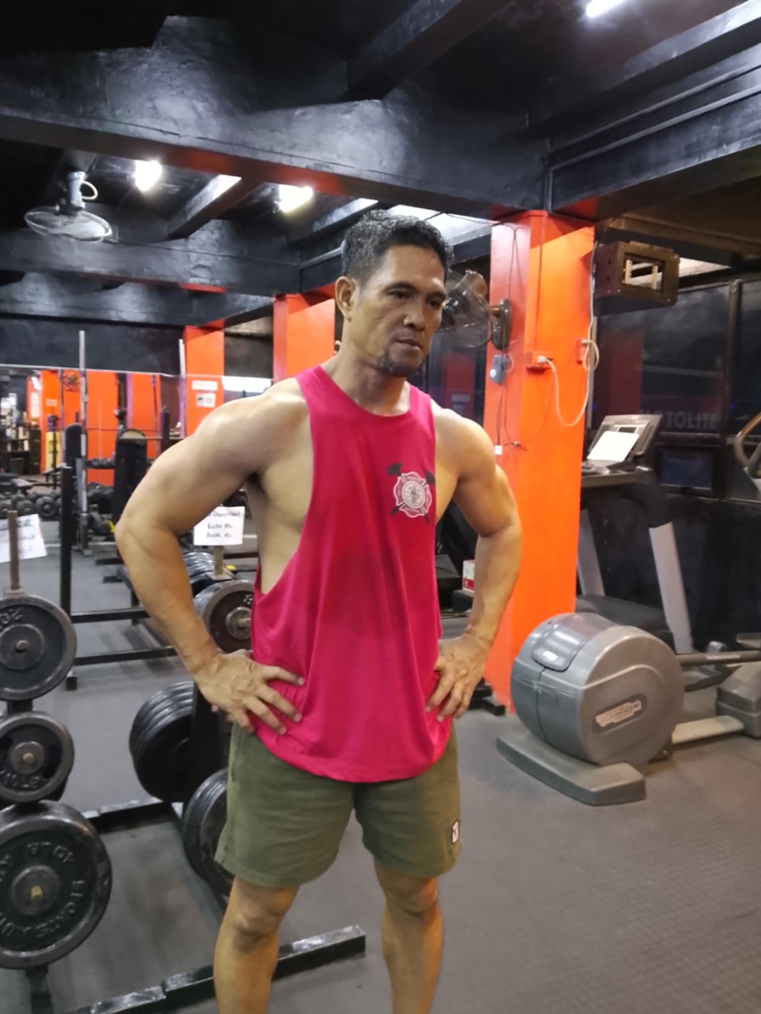 Fireman pose in the gym